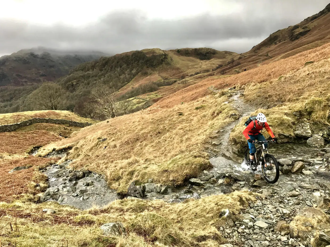 Mountain bike rider tackling the rocks